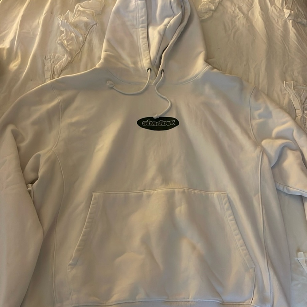 in perfect condition. Only worn once, Shadow Hill white with green hoodie.